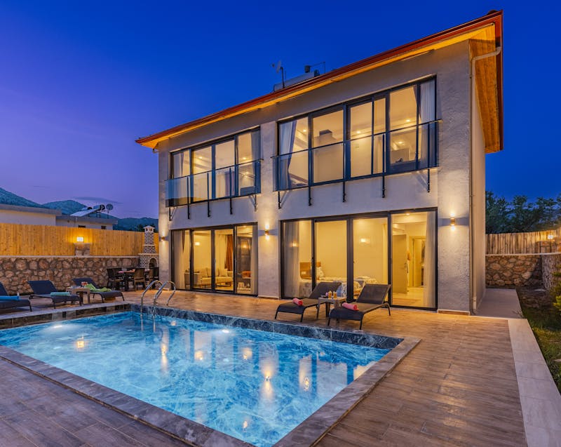 a house with stunning outdoor lighting