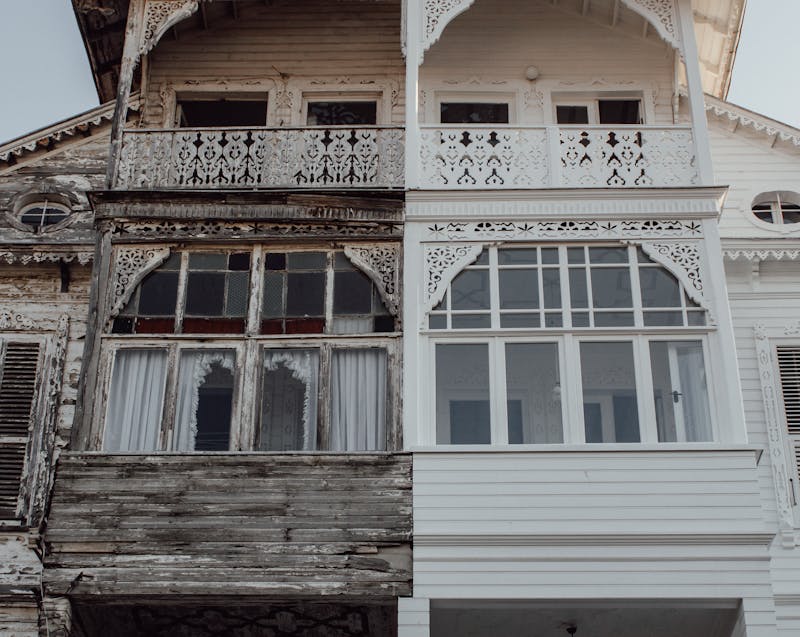 an old white house being restored